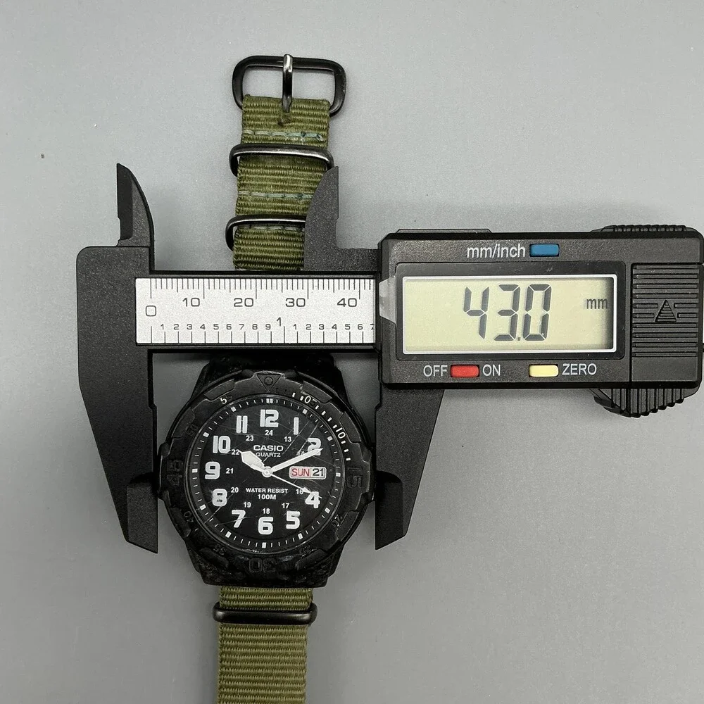 Casio MRW-200H Mens Watch 43mm Black Dial Green Day Date 100M New Battery